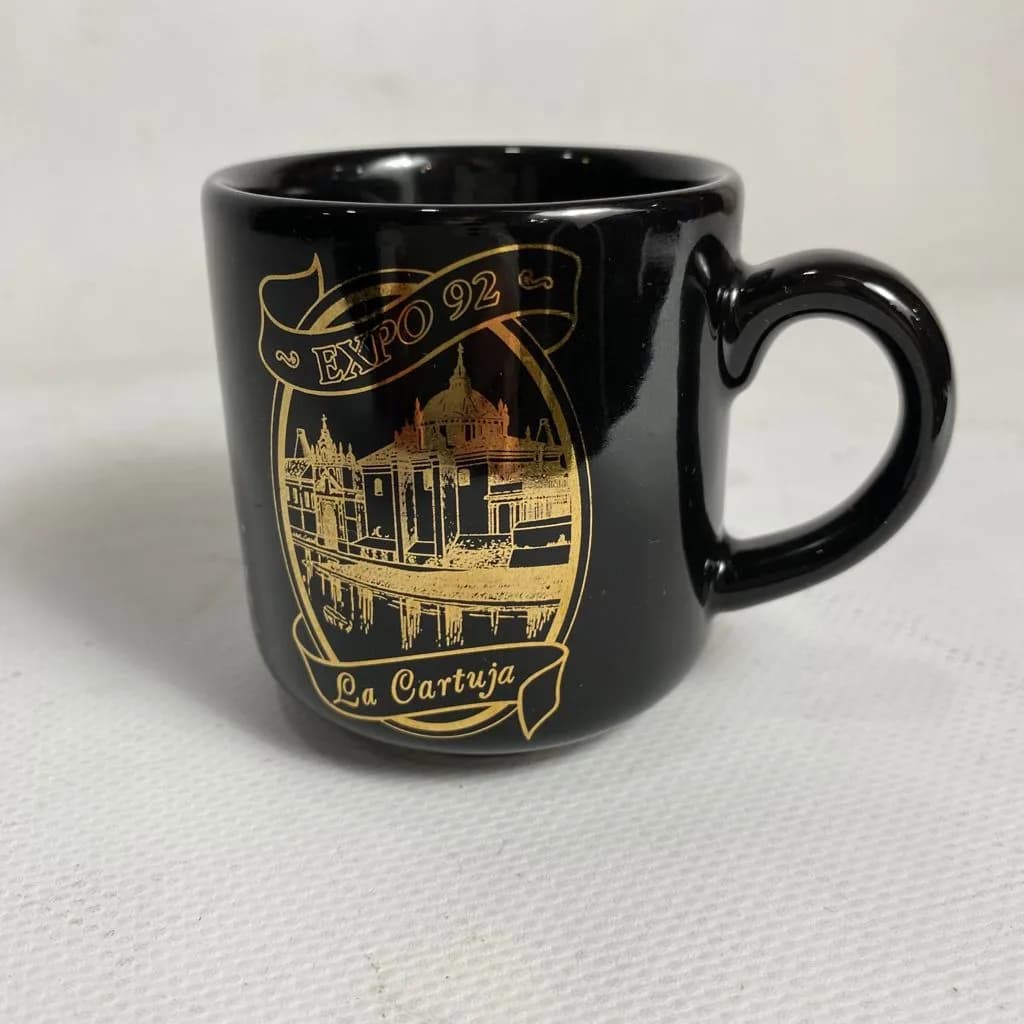 Taza cerámica expo 92 negra y dorada 25cl