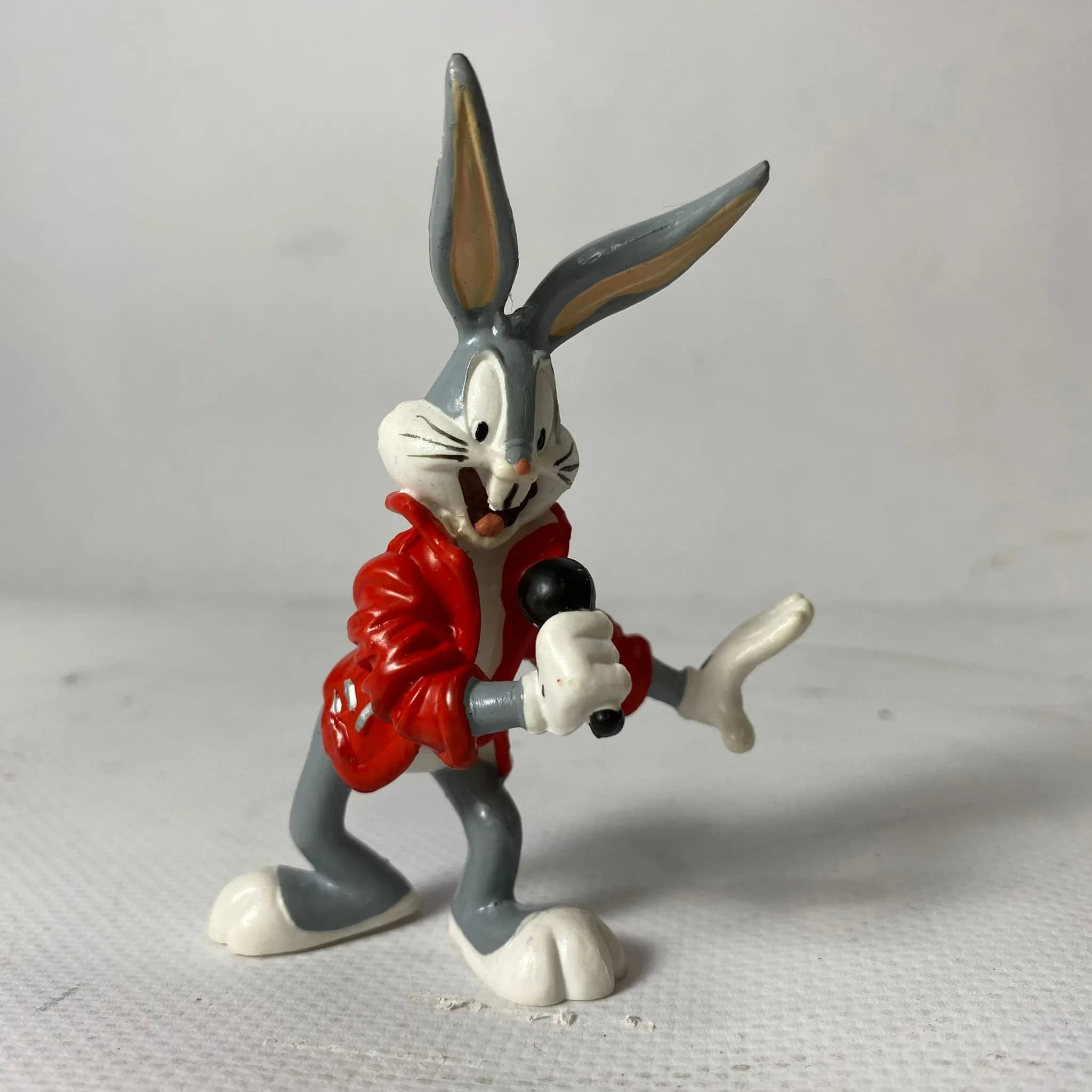 Bugs Bunny con micrófono muñeco miniatura PVC
