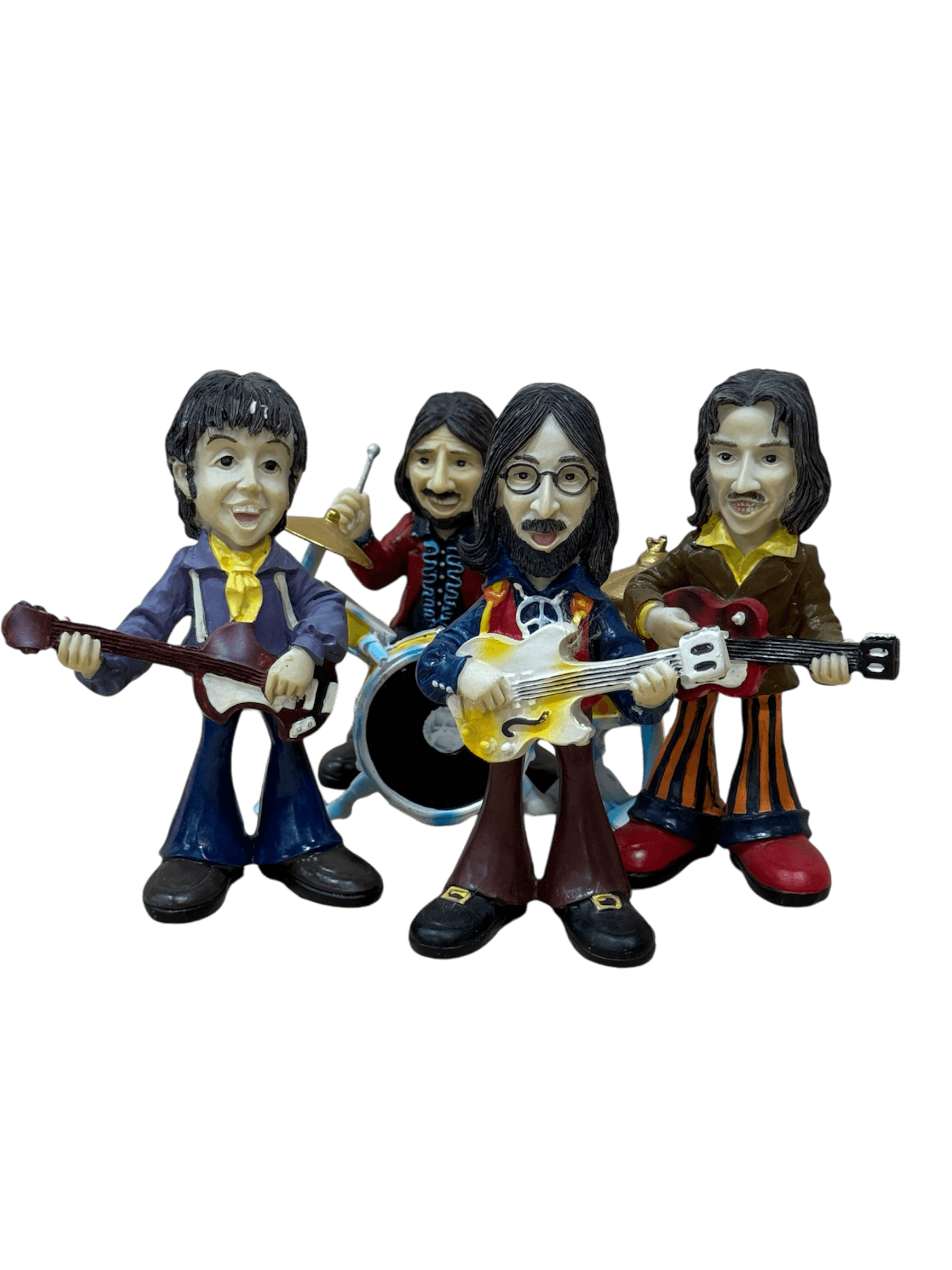 The Beatles figuras resina colección